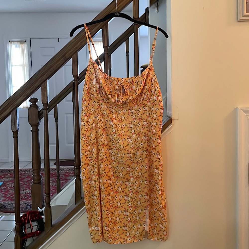 Boohoo size 12 sundress. Yellow with a white and red floral pattern!